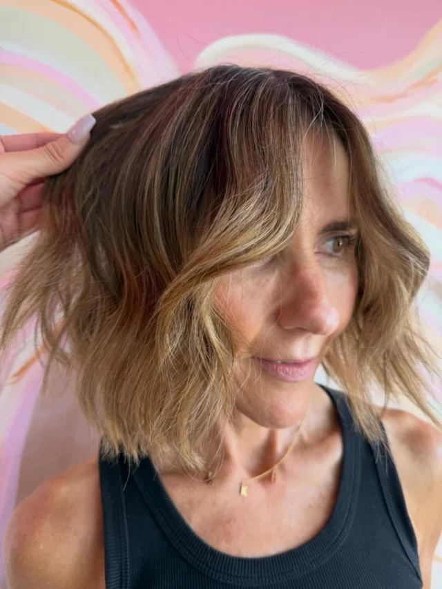 Starting to see greys pop through⁉️

You don’t always need full coverage.
By creating texture with strategic highlights and lowlights, 
we blend the greys into the overall colour so they soften instead of stand out ✨

✔️More dimension.
✔️Softer regrowth.
✔️Lower maintenance.
✔️Grey blending = no harsh root lines 🤍

Hair By @amy_urbanchic_ 

#greyblending #wellahair #makeityou #brisbanehairsalon